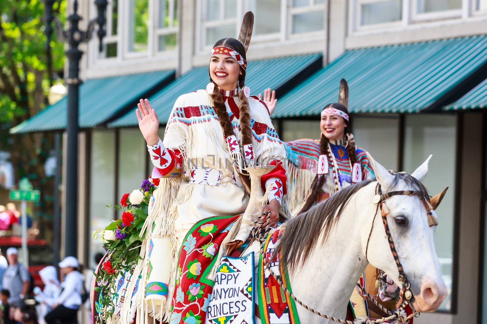 Portland, Oregon, USA - JUNE 7, 2014: Royal Court of the Happy Canyon Night Show in Grand floral parade through Portland downtown.