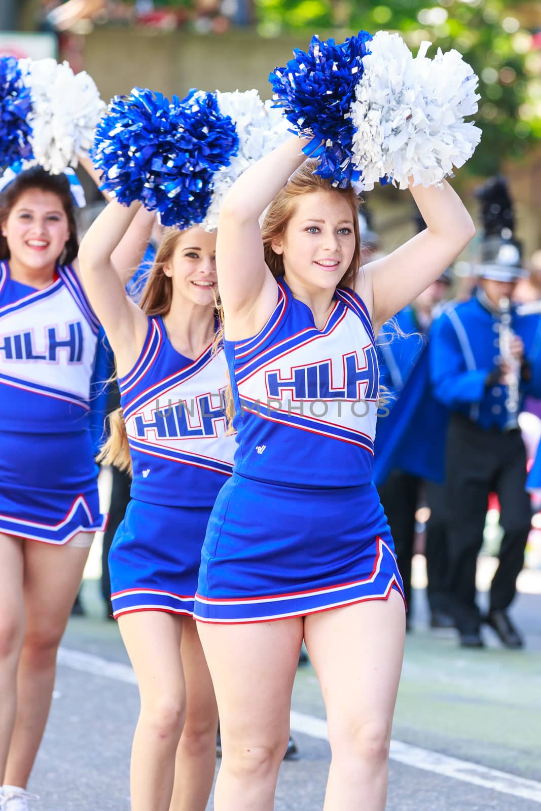 Portland, Oregon, USA - JUNE 7, 2014: Hillsboro High School Marching Band in Grand floral parade through Portland downtown.