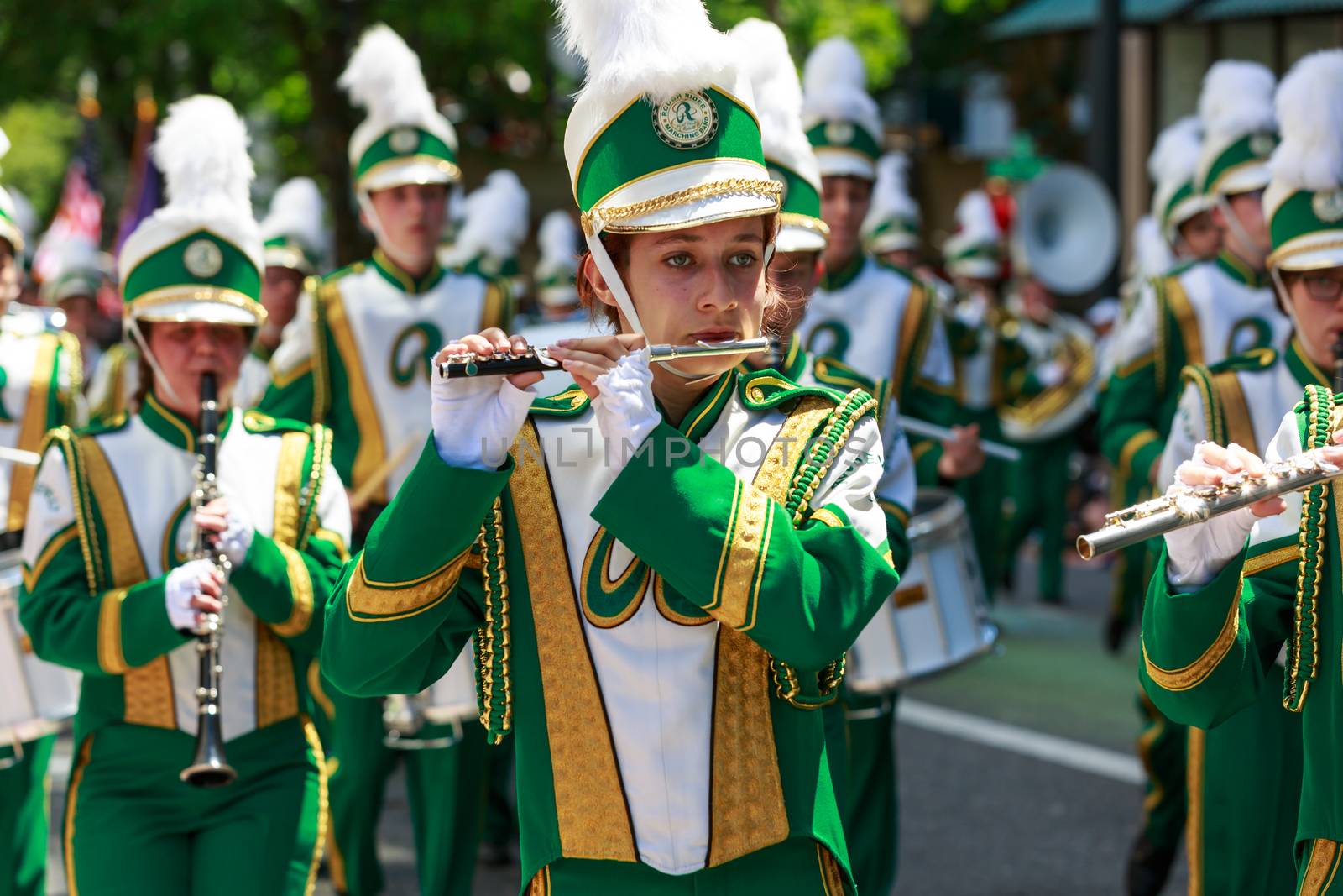 Portland, Oregon, USA - JUNE 7, 2014: Roosevelt High School Marching Band in Grand floral parade through Portland downtown.