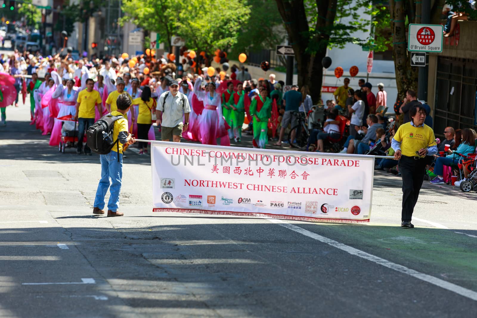 Portland, Oregon, USA - JUNE 7, 2014: Northwest Chinese Alliance in Grand floral parade through Portland downtown.