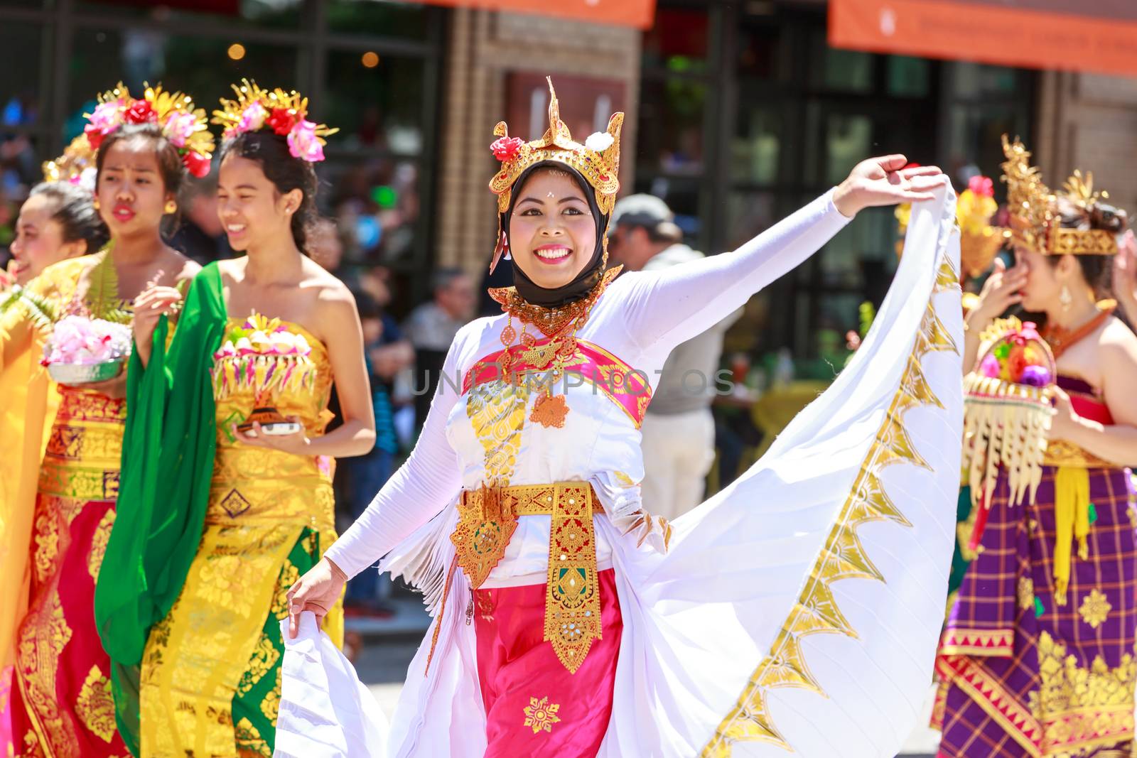 Portland, Oregon, USA - JUNE 7, 2014: Indonesian Community of Oregon in Grand floral parade through Portland downtown.