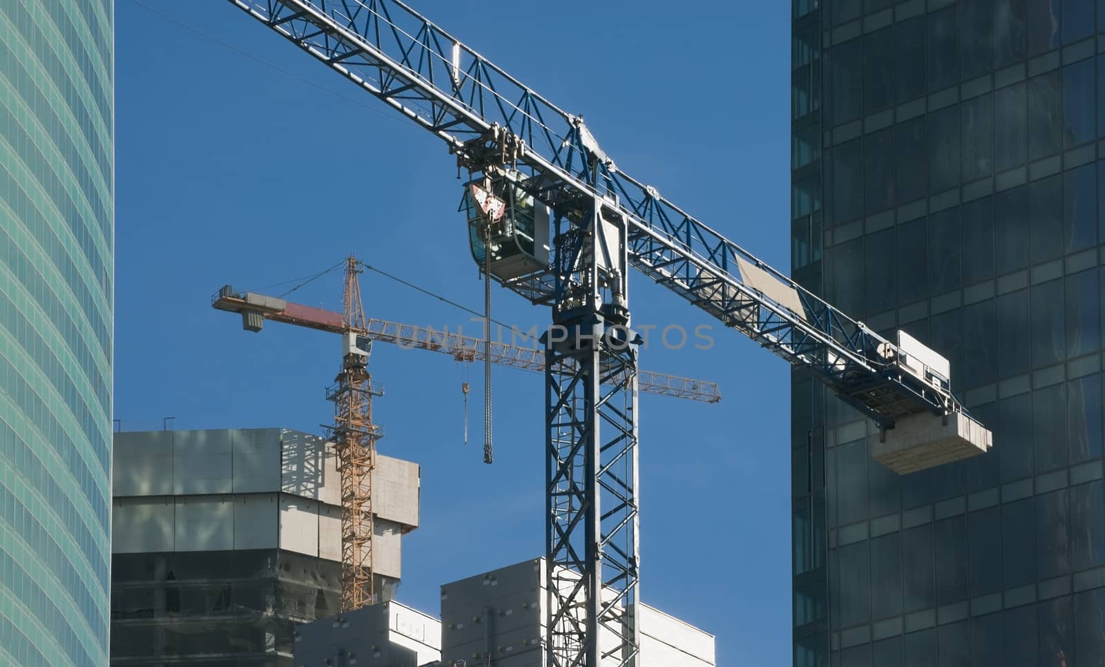 Elevating cranes on the construction site of Moscow business center