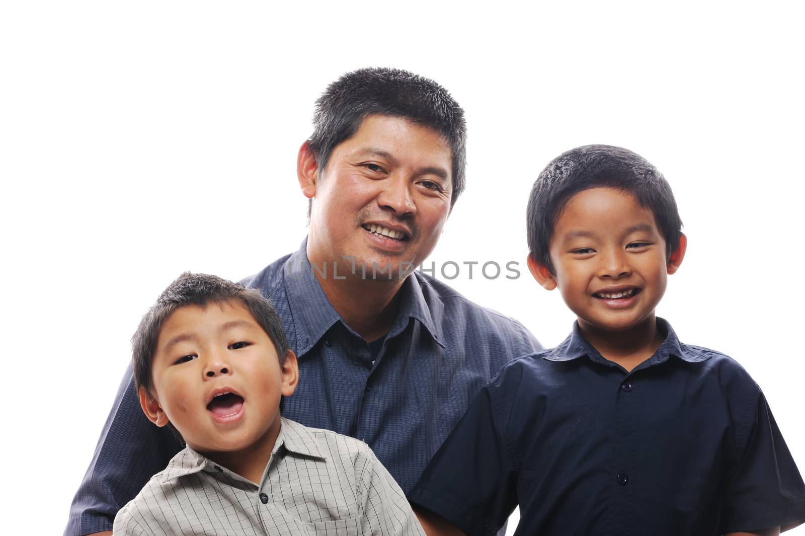 Asian father embracing his happy sons