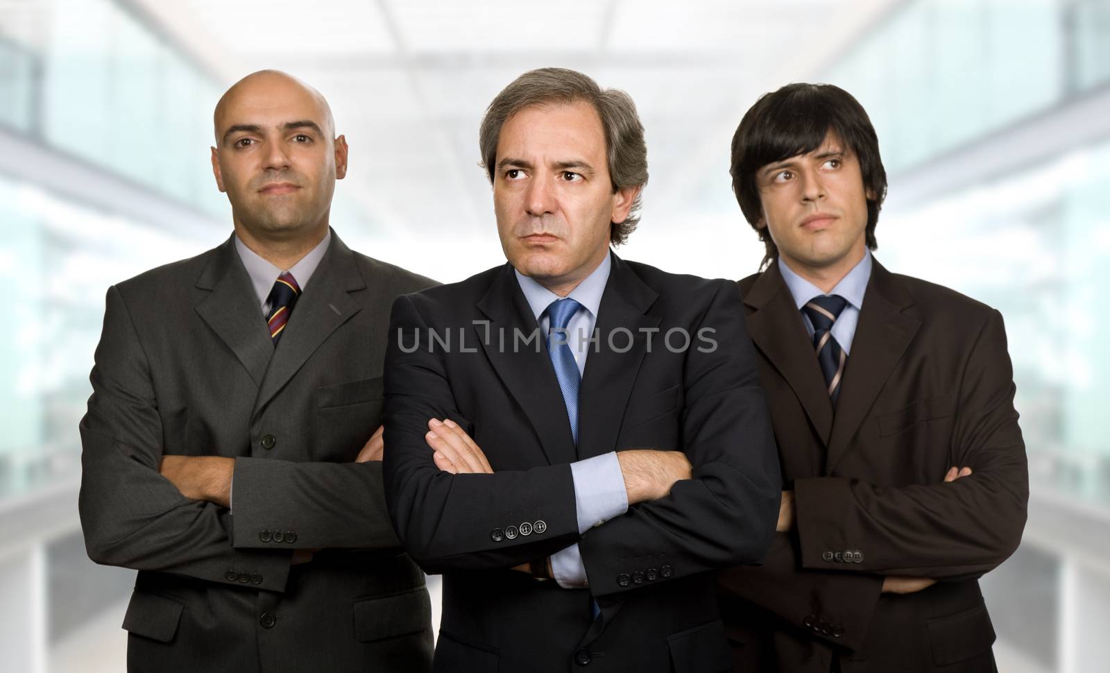 three business men at the office