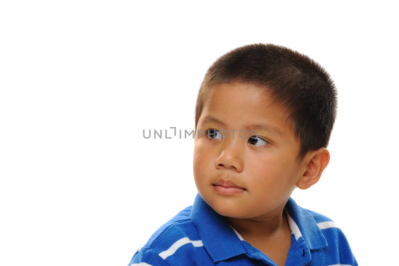 Asian boy looking away wearing blue shirt