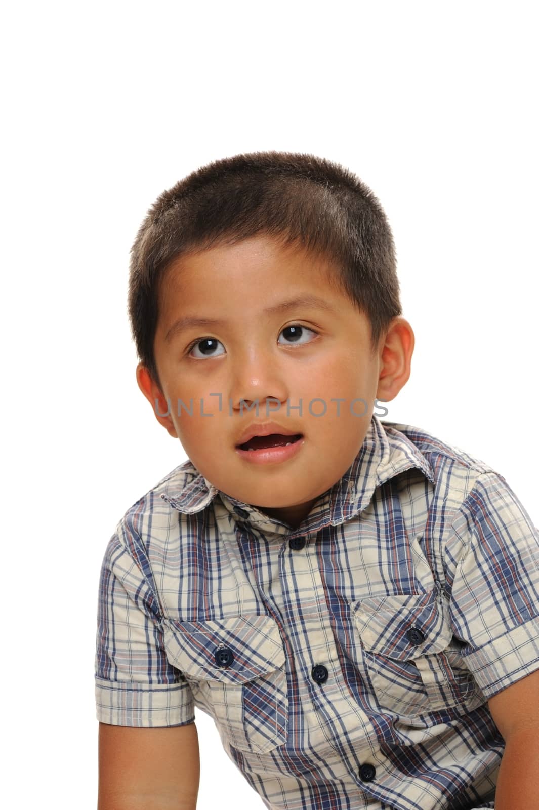 Asian boy wearing fashionable shirt looking up