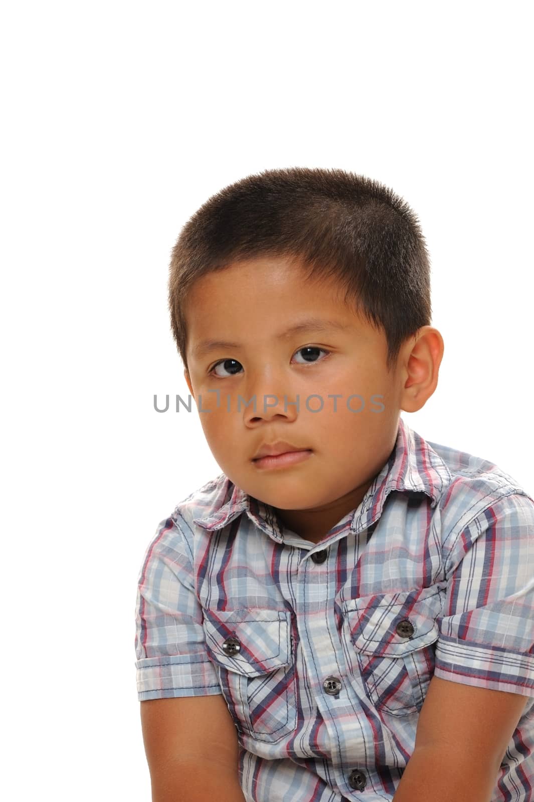 Asian biy wearing fashionable shirt looking at camera