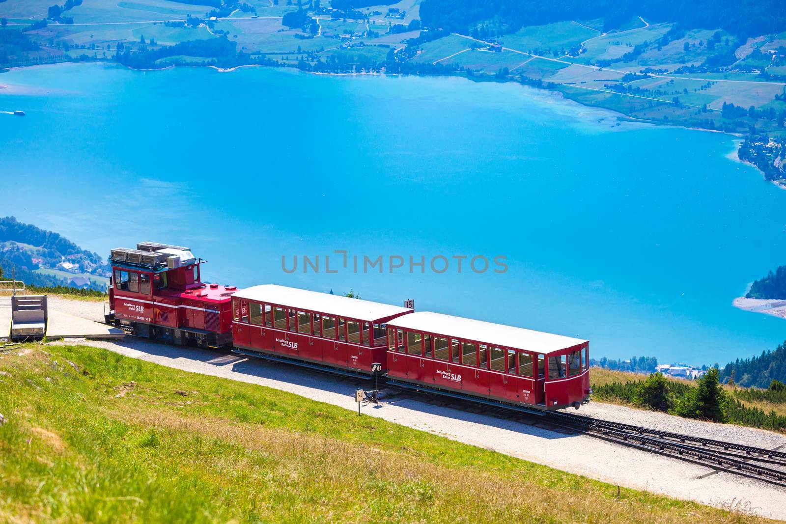 ST. WOLFGANG, AUSTRIA - AUGUST 6: Diesel train railway going to Schafberg Peak (1783m) on August 6, 2013 in St. Wolfgang.