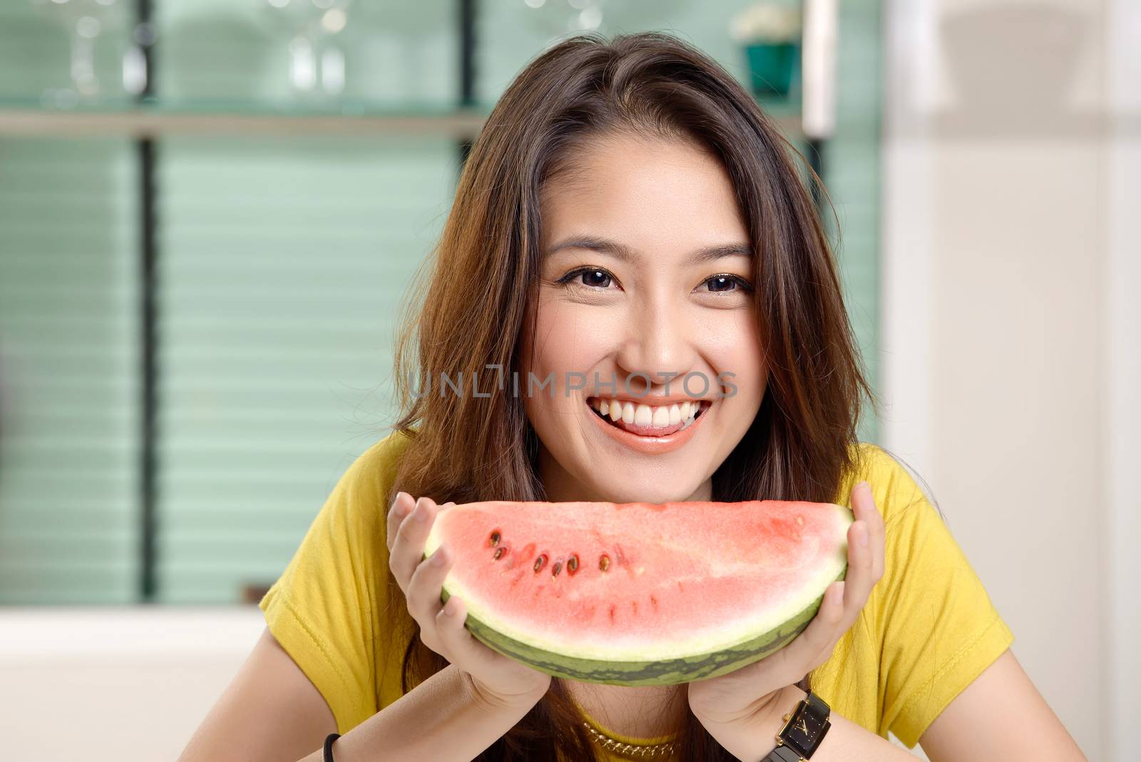 Young Asian cute woman and Eating watermelon