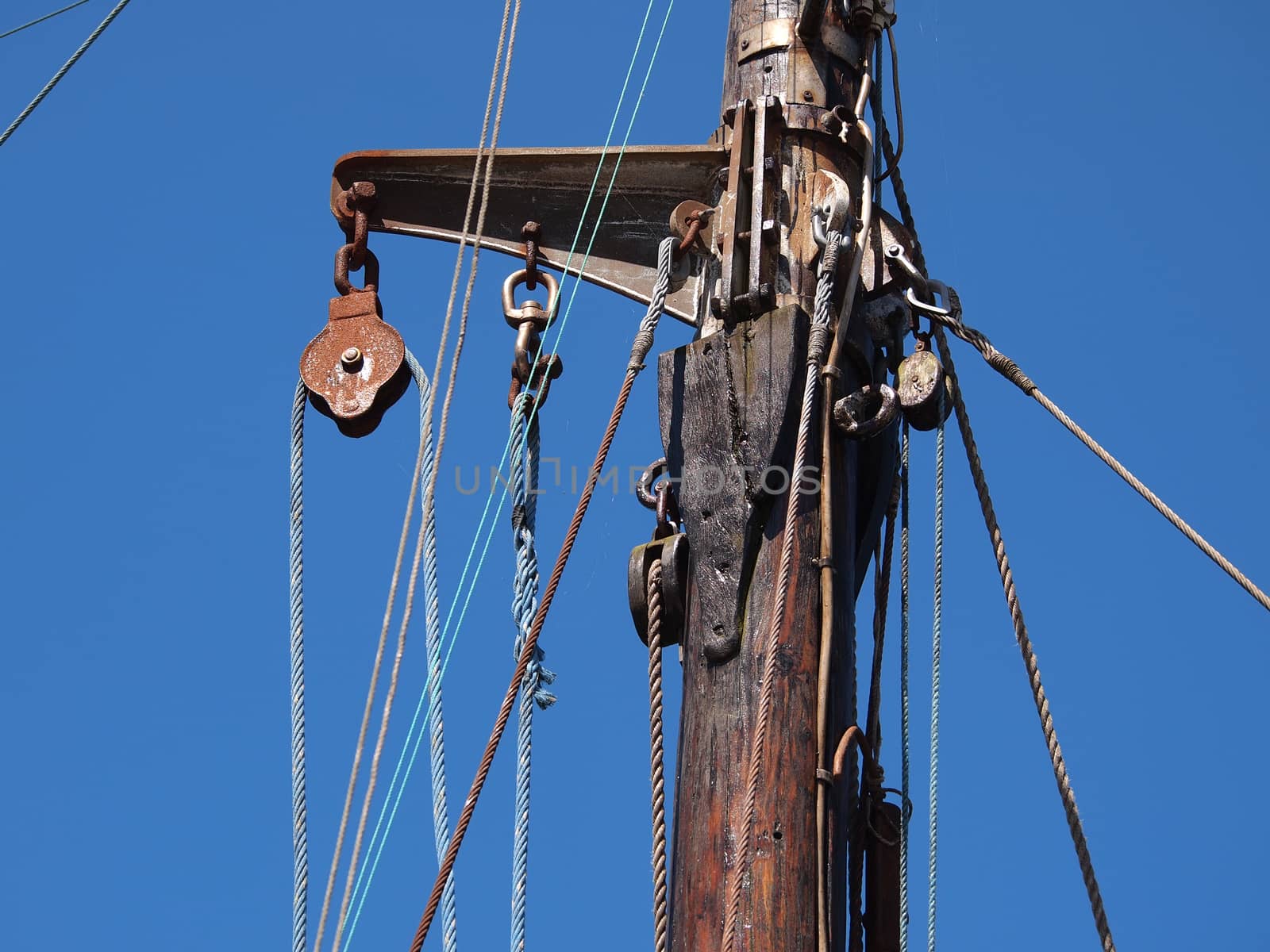 Pulley for sails and ropes made from wood on an old sail boat