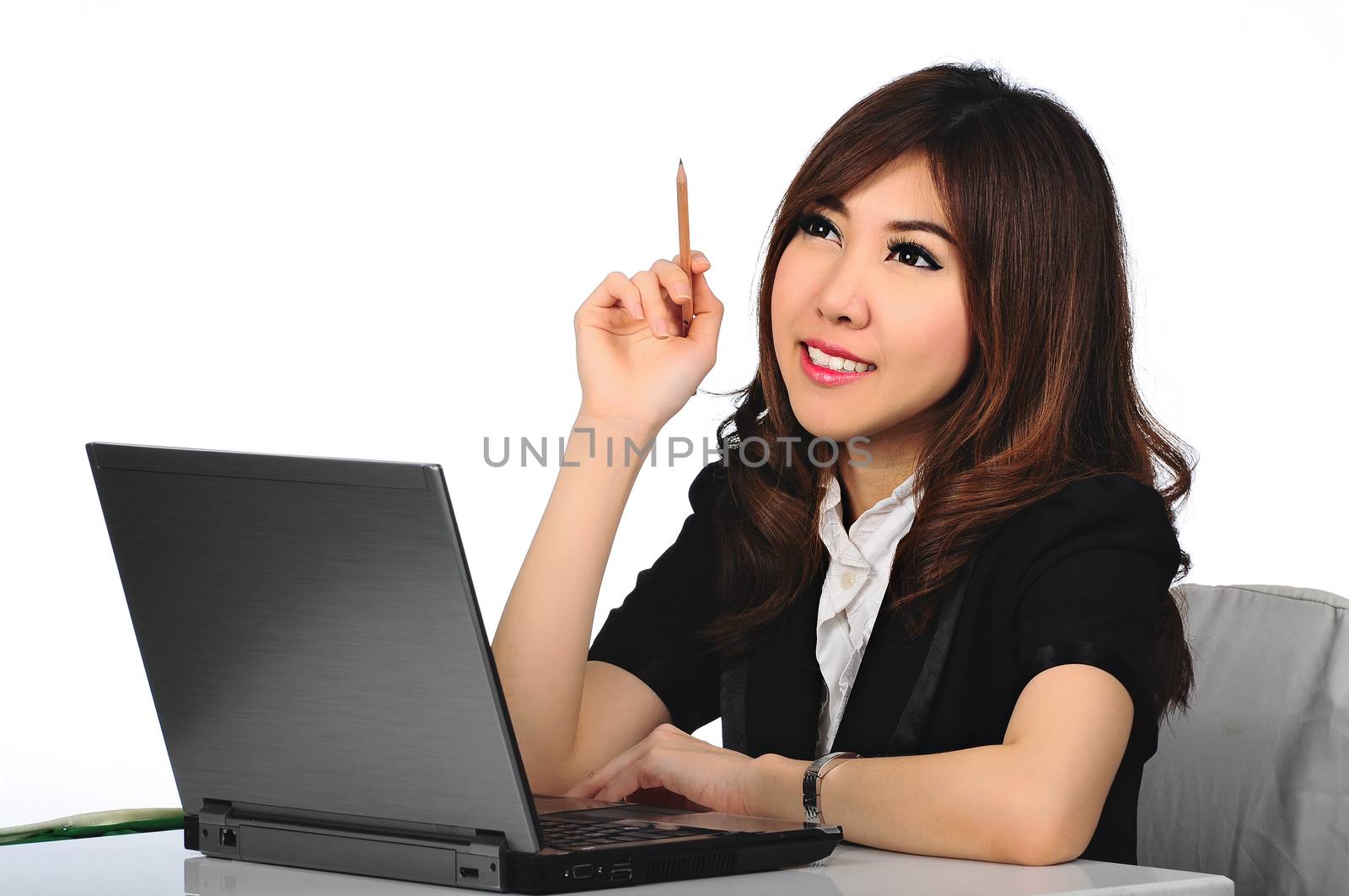 Young business woman working at office