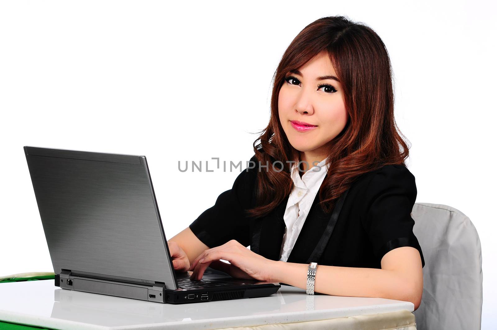 Young business woman working at office