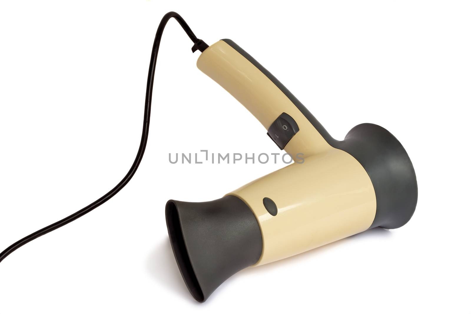 The convenient electric hair dryer for drying of hair. It is presented on a white background.