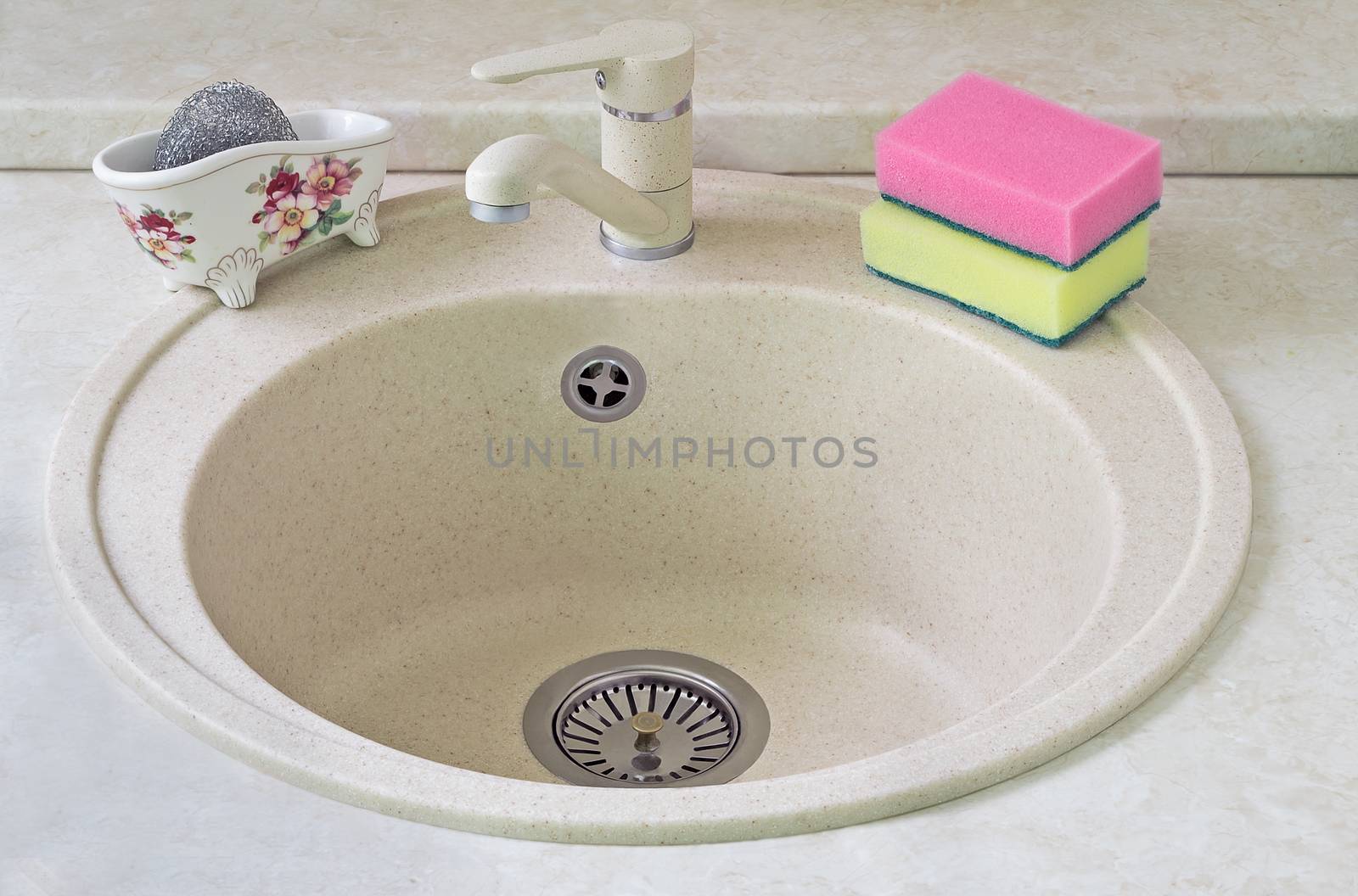Sink for ware from metal ceramics and a sponge for washing. by georgina198