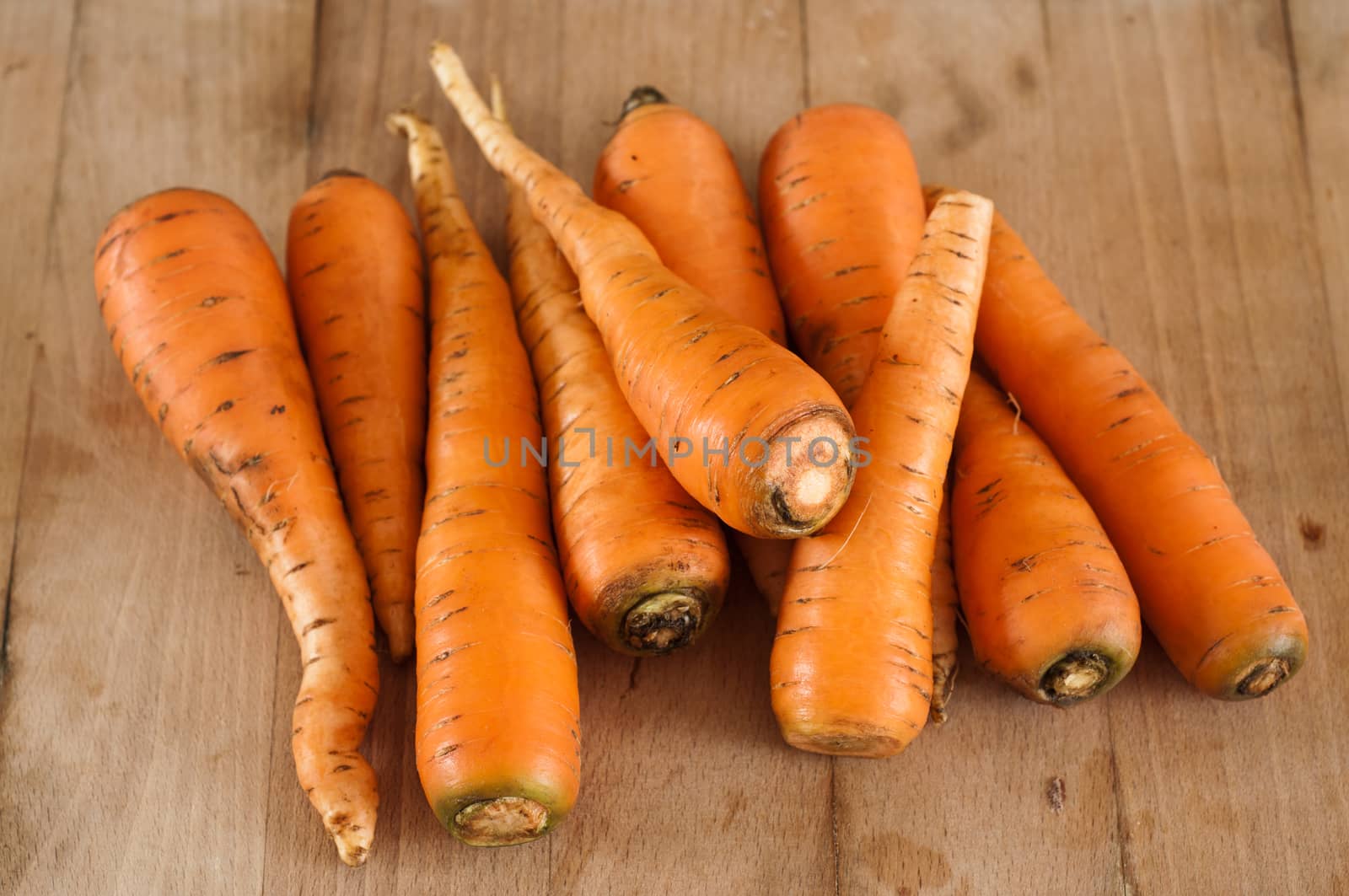group of Carrots by NeydtStock