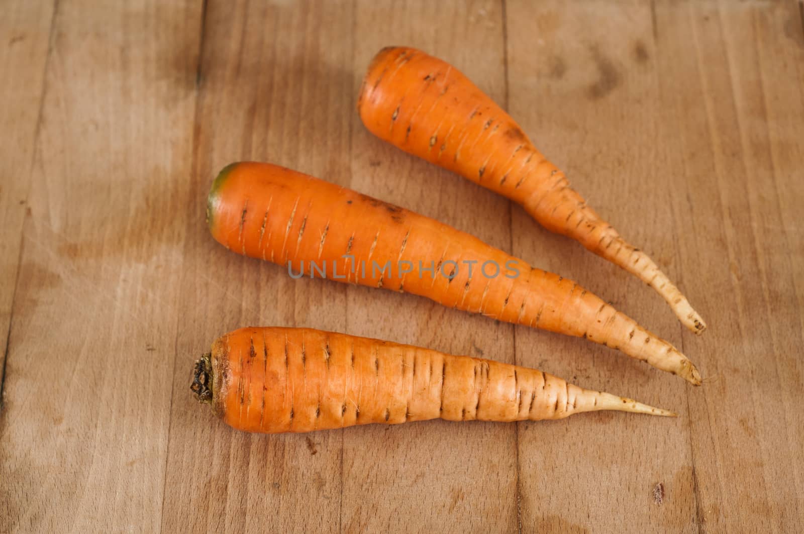 group of Carrots on wooden board