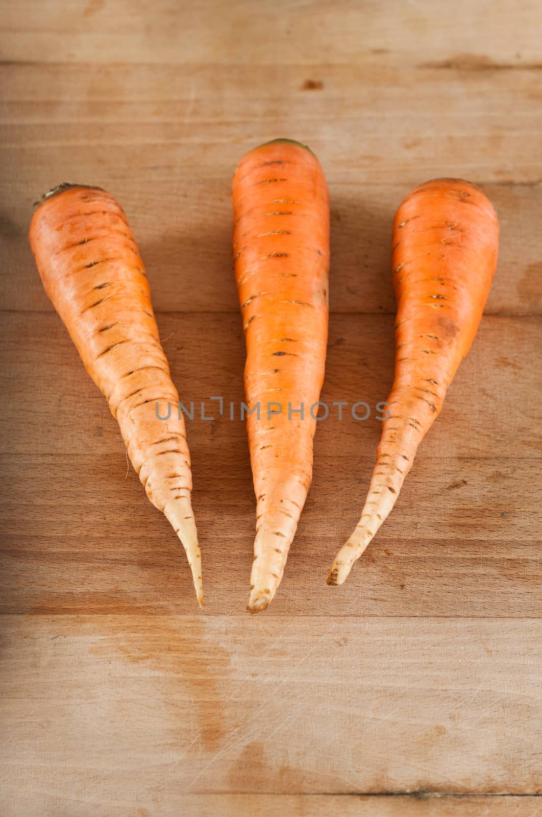 group of Carrots on wooden board