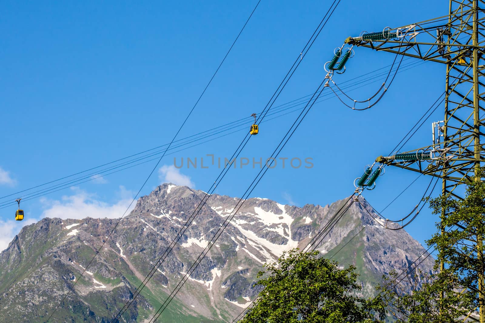 The wagoons of ski station and power lines Austria