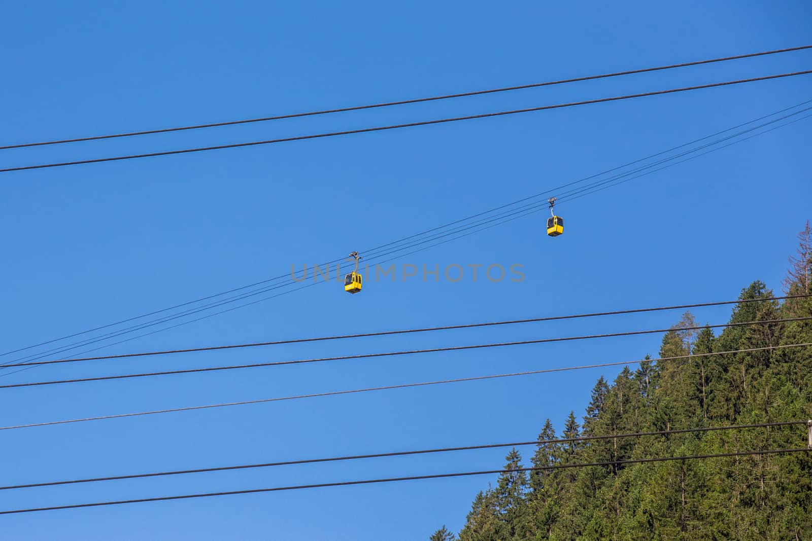 The wagoons of ski station and power lines Austria