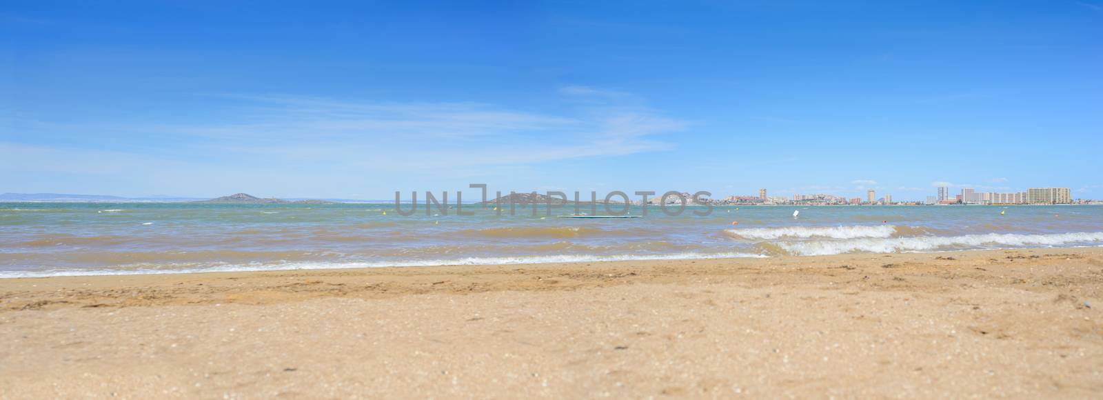 European sandy beach and blue sea, panoramic photo