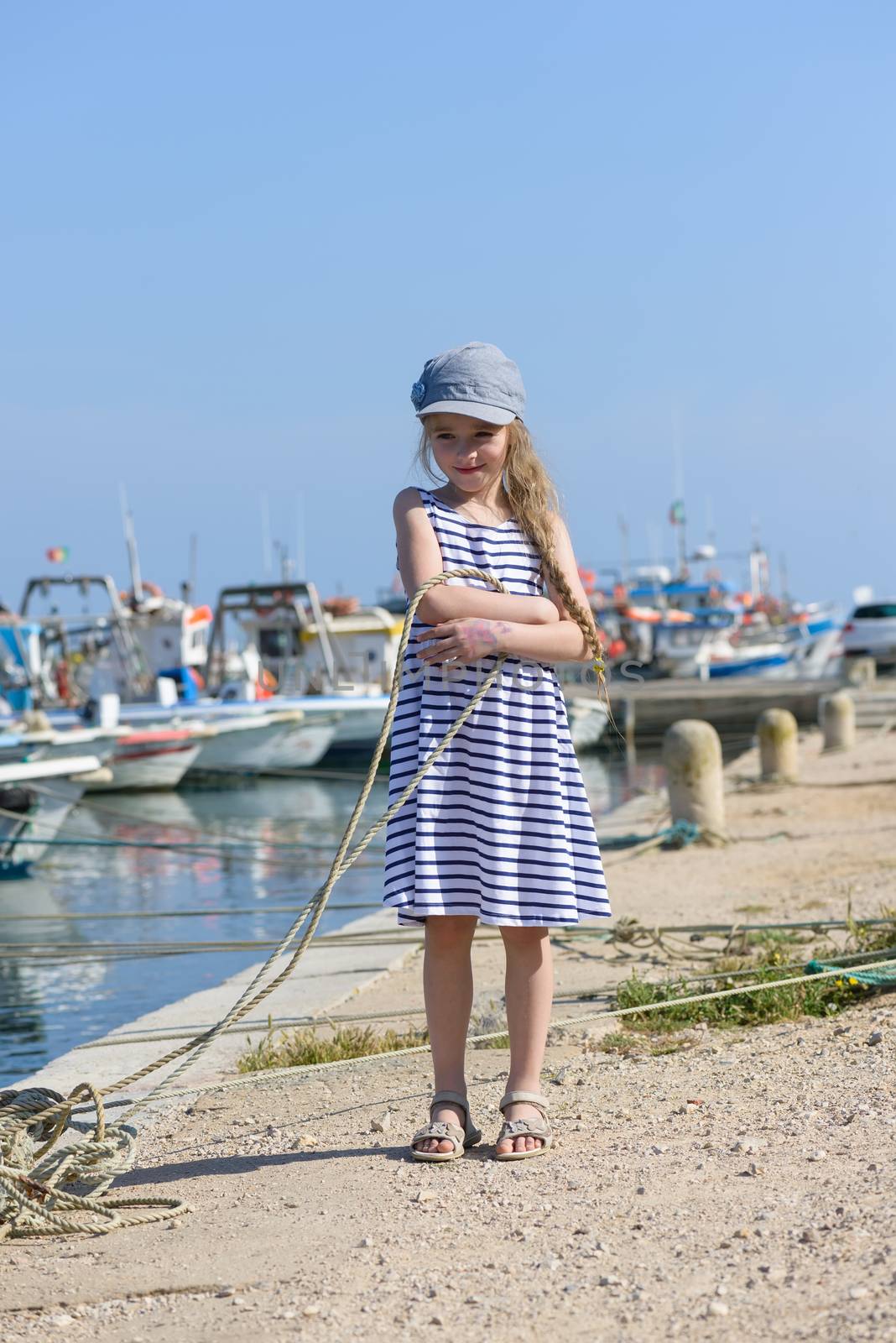 Adorable little girl at fisherman village by anytka