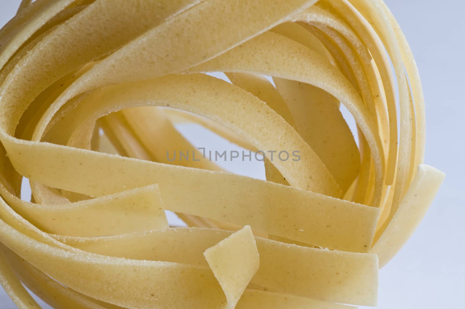 tagliatelle isolated closeup with white background