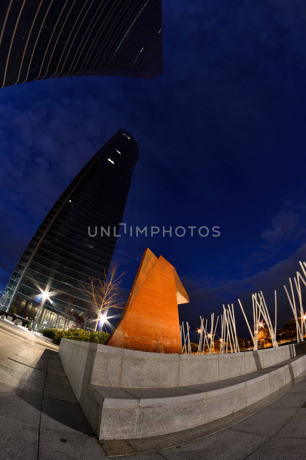 two towers through a fisheye lens, by night, Madrid, Spain by ncuisinier