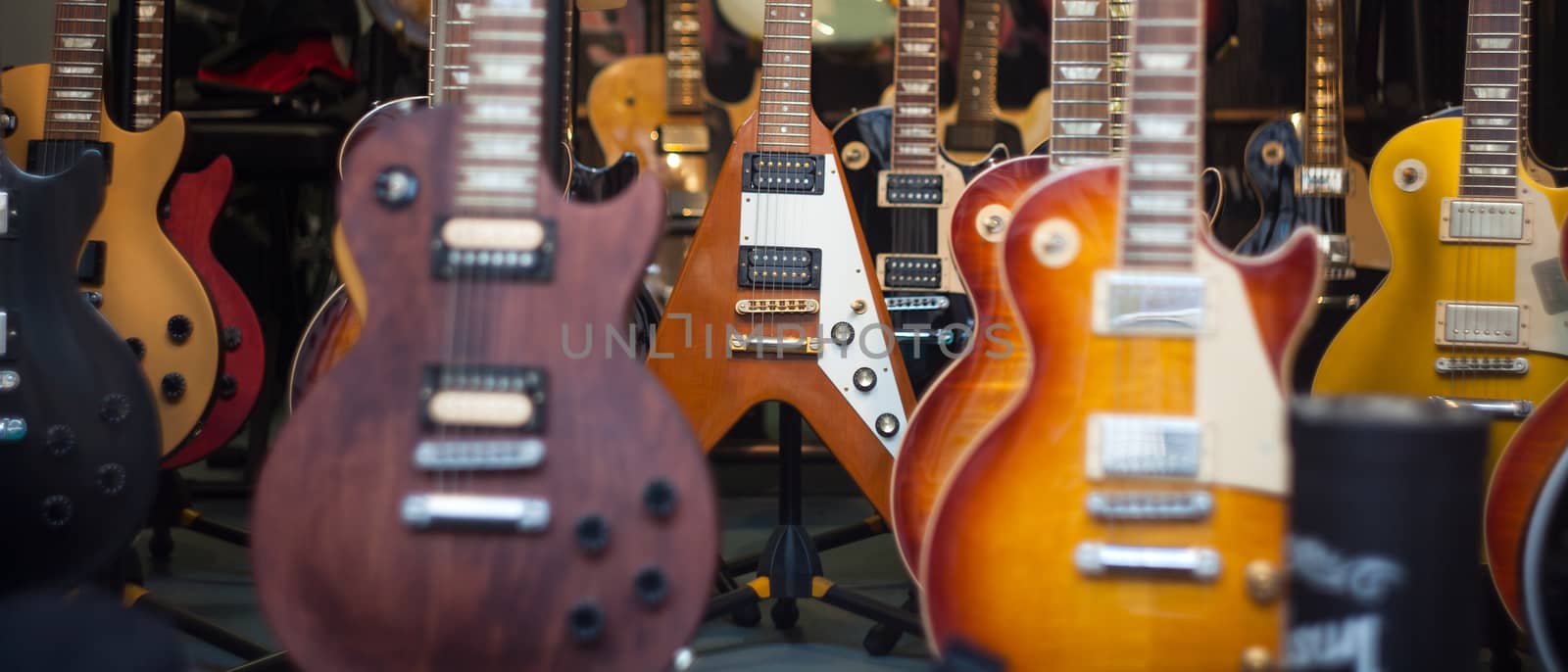 View of many guitars in the shop