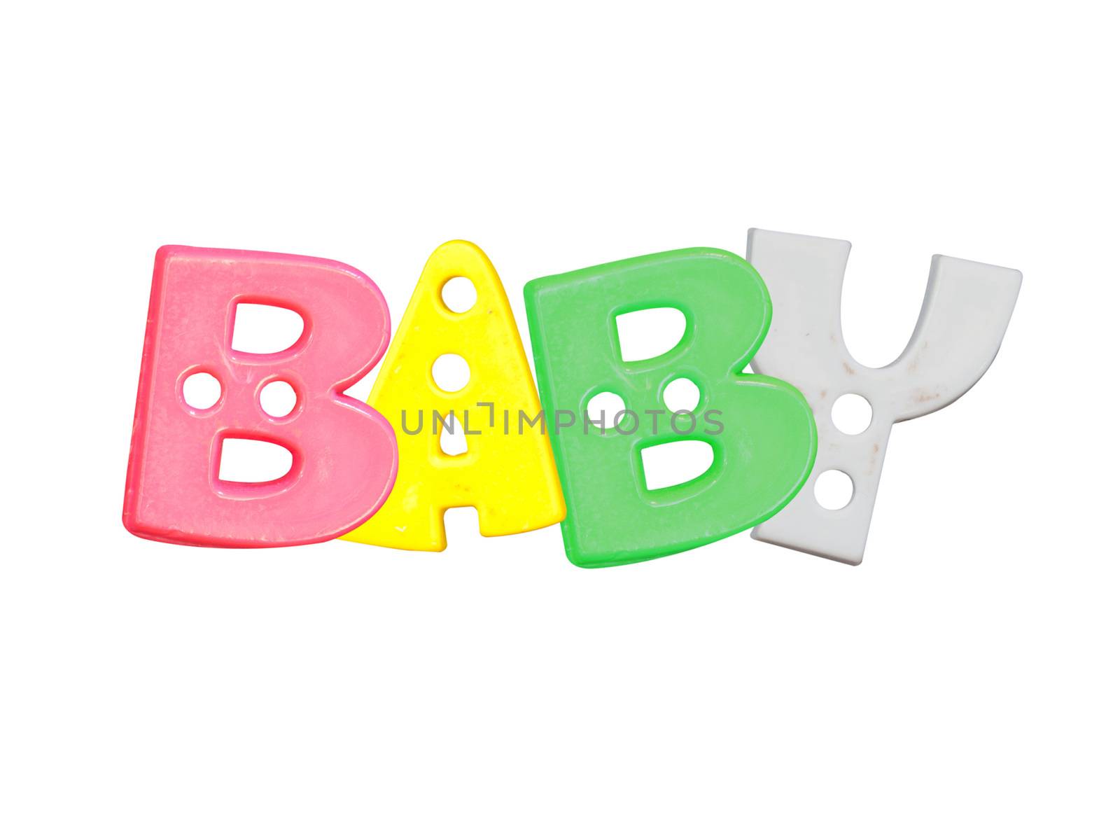 Alphabet baby plastic letters on a white background