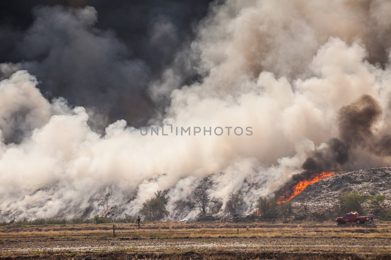 Burning garbage heap of smoke from a burning pile of garbage