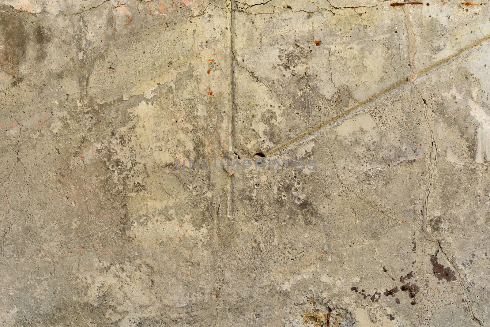 The old, cracked concrete surface. Close up