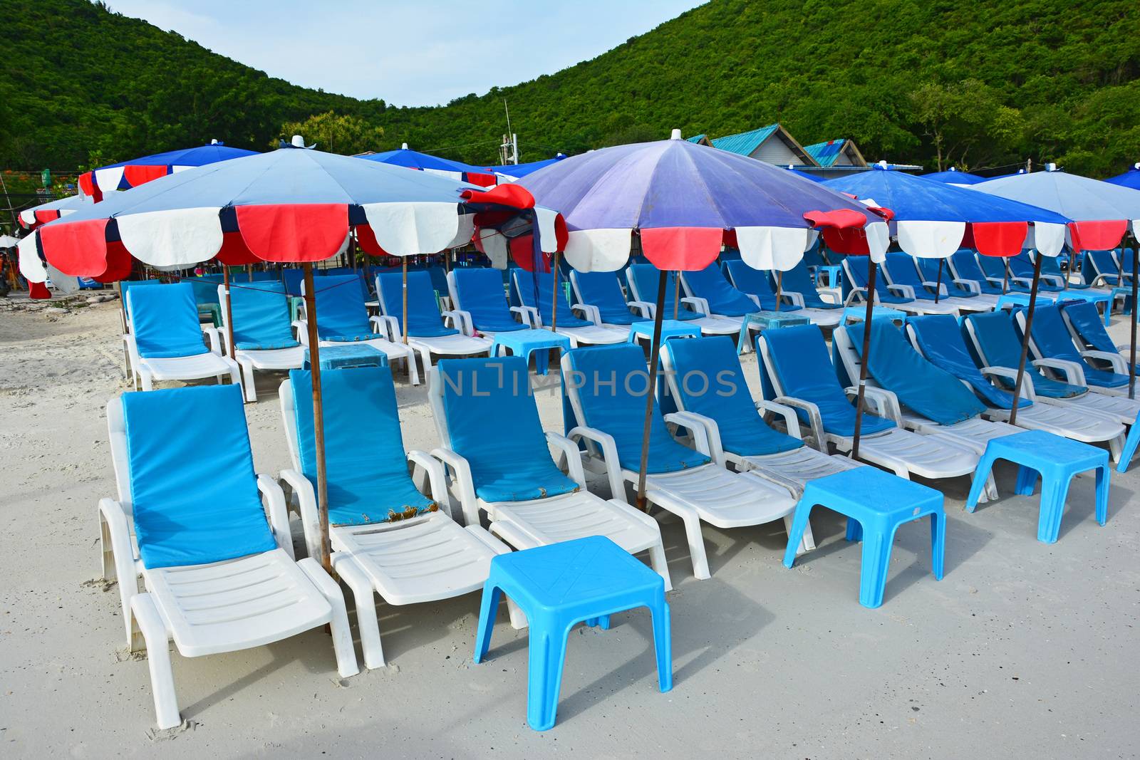 beach chairs and umbrella at Koh Larn, Pataya,Thailand