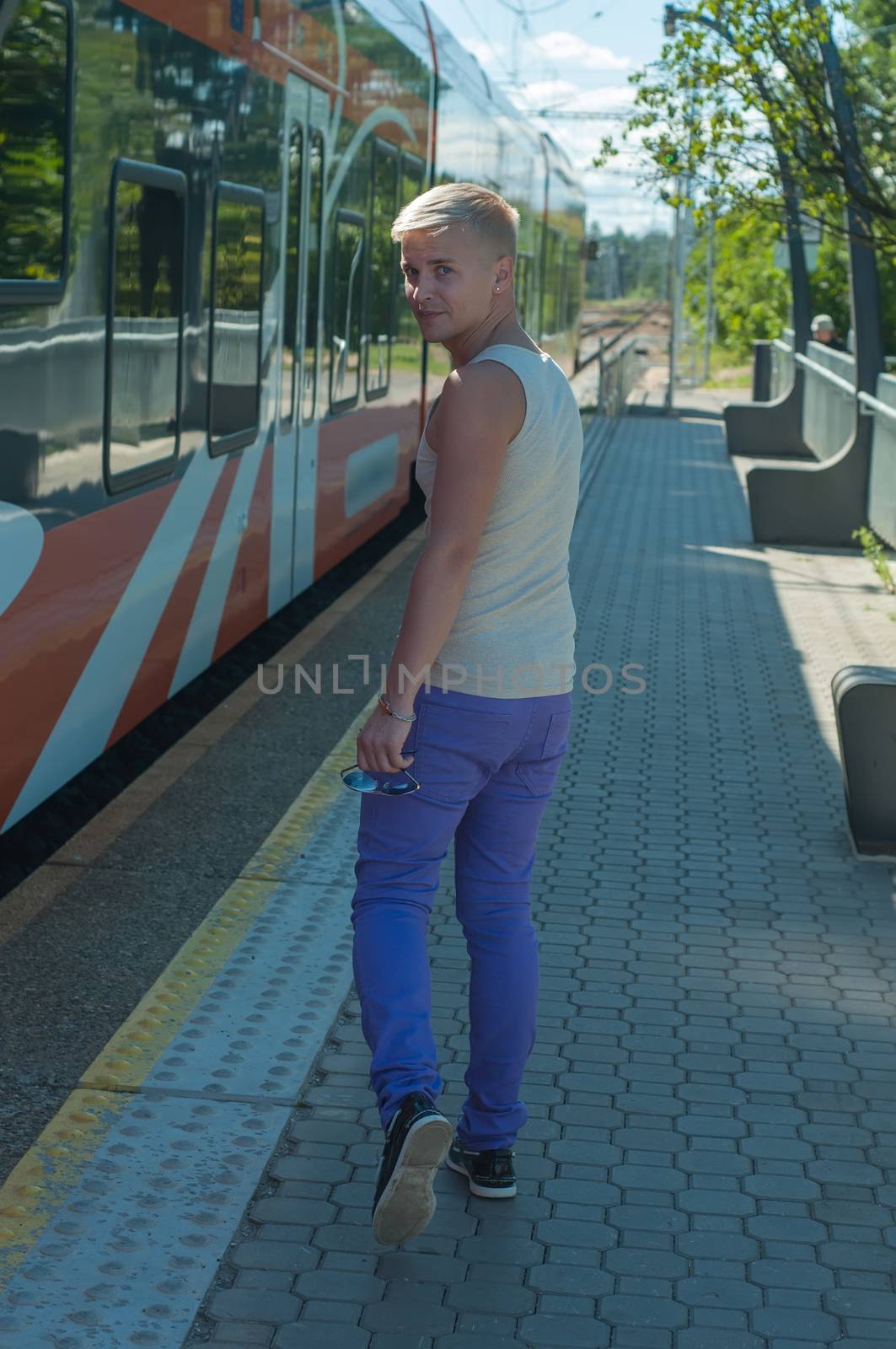 Man walking on the background of the train by anytka