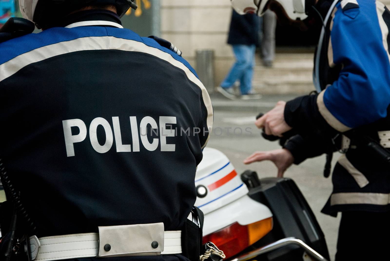 french policeman with motorcycle back