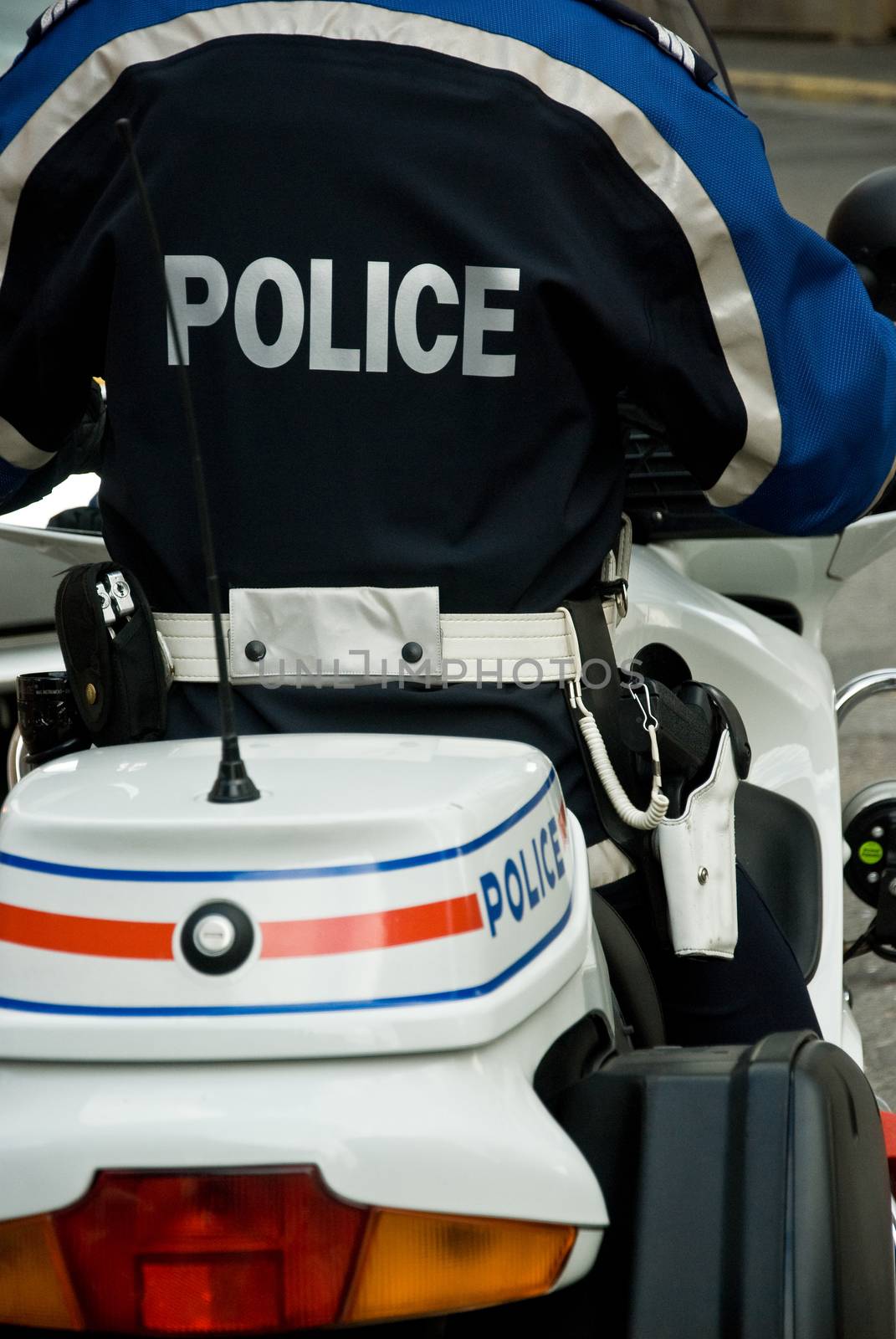 french policeman with motorcycle back