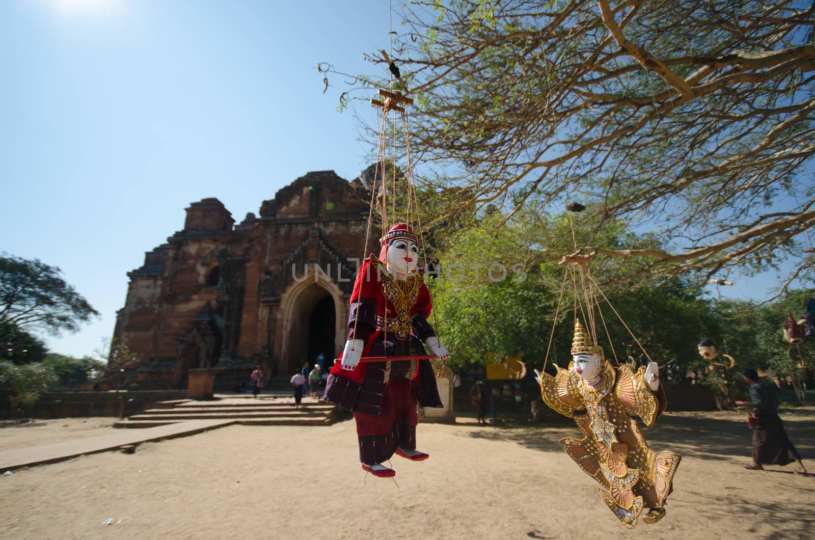 Burmise traditional puppet in front of ancient pagoda, Myanmar