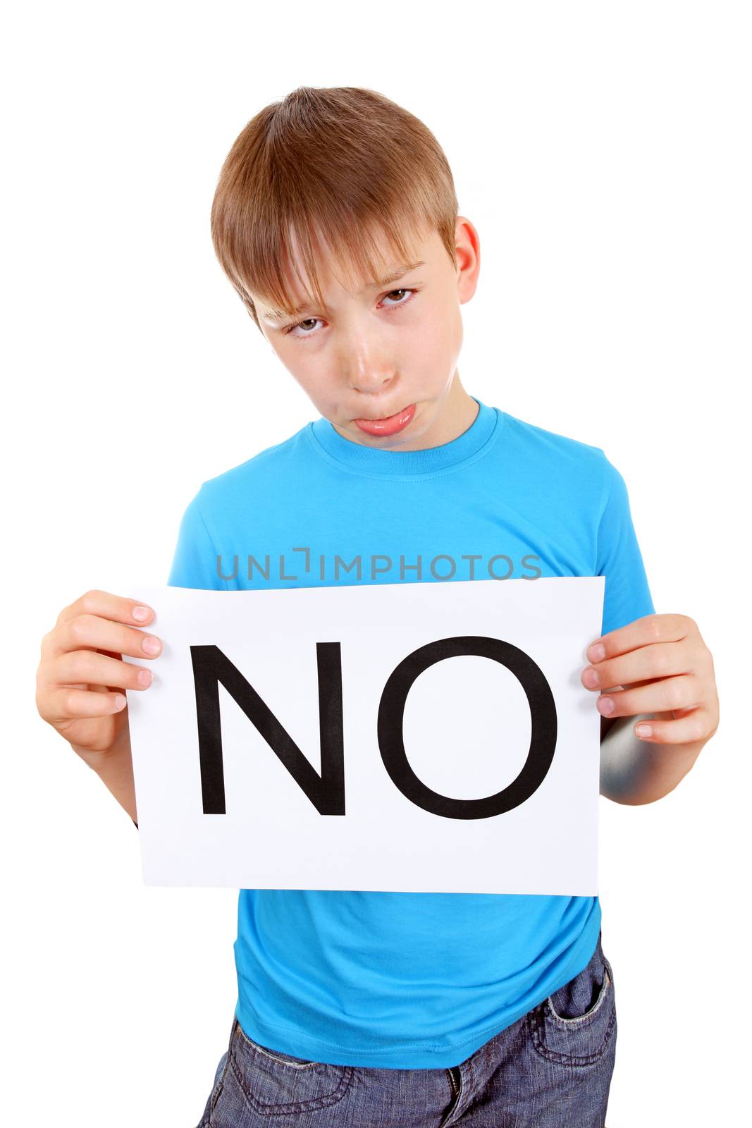 Sad Kid hold a sheet with slogan NO Isolated on the White Background