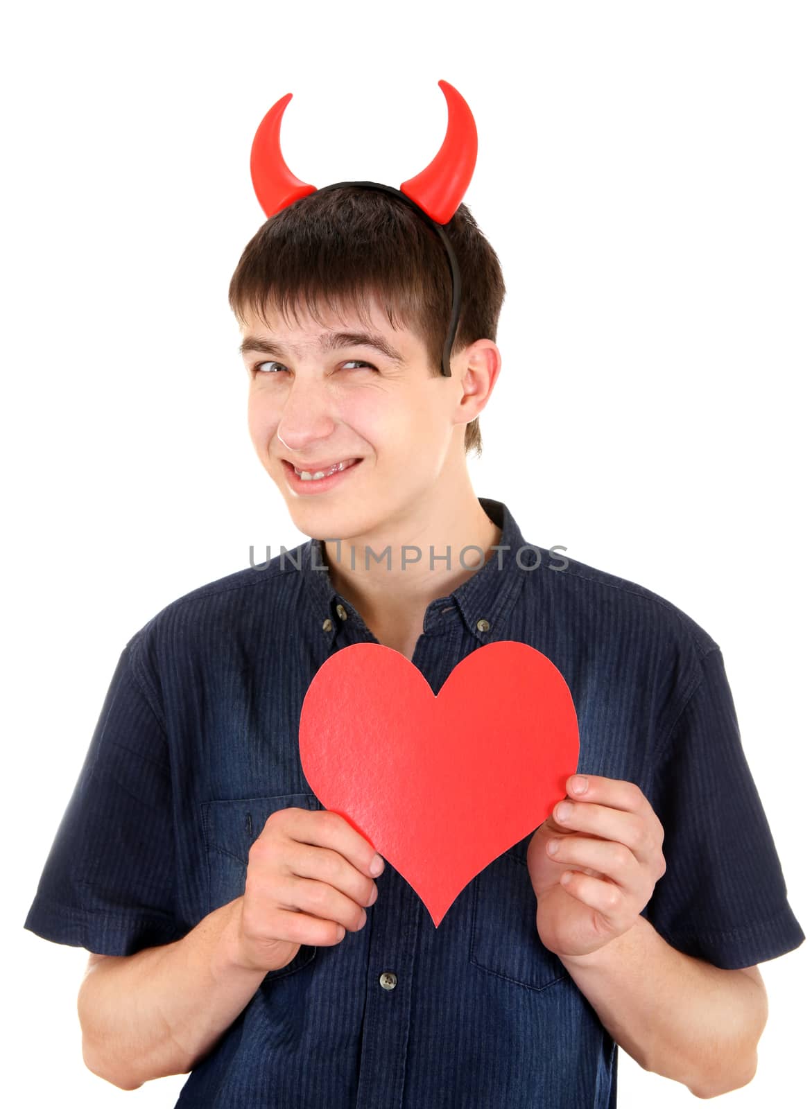 Sly Teenager with Devil Horns and Red Heart Shape Isolated on the White Background