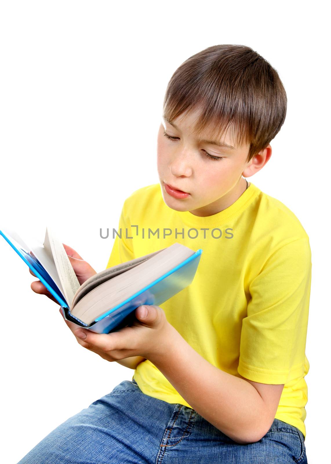 Kid with a Book Isolated on the White Background