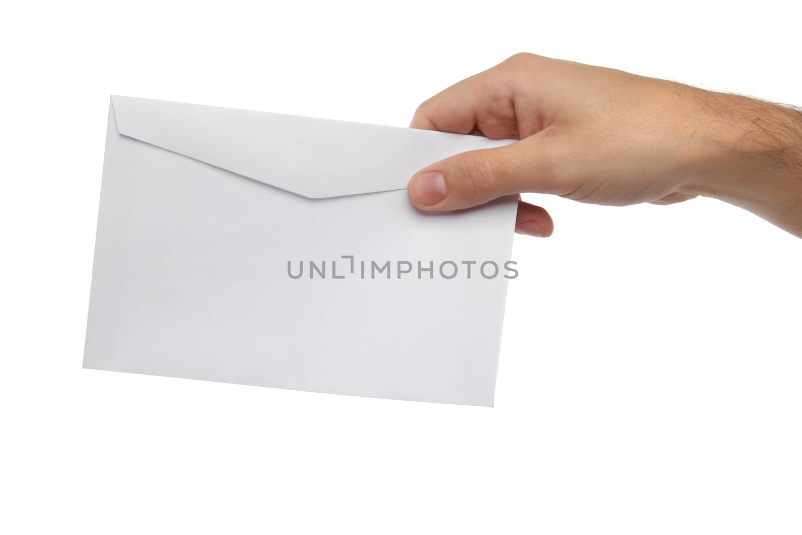 Male hand holding blank envelope isolated on white