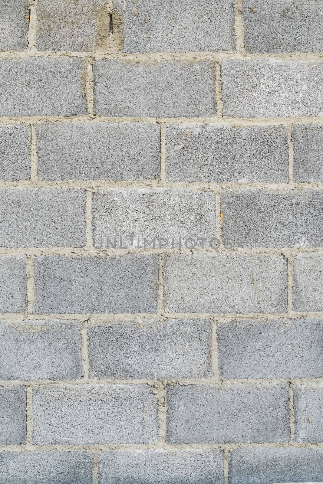 Grey stone bricks wall texture or background