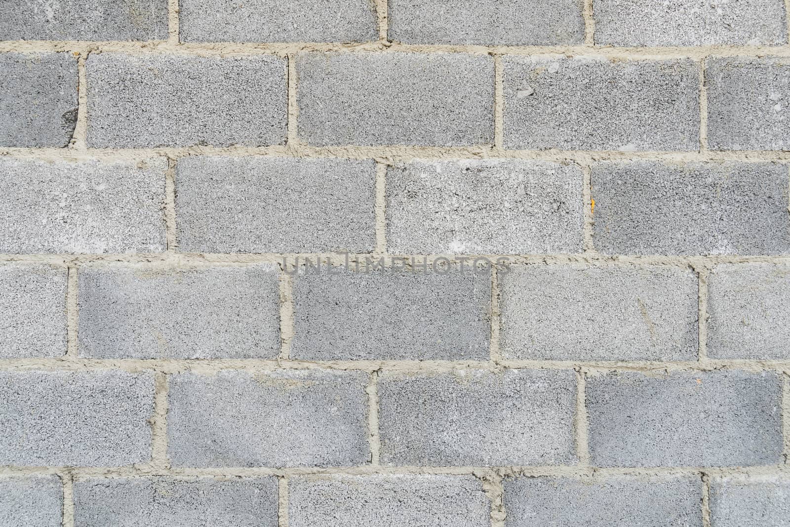 Grey stone bricks wall texture or background