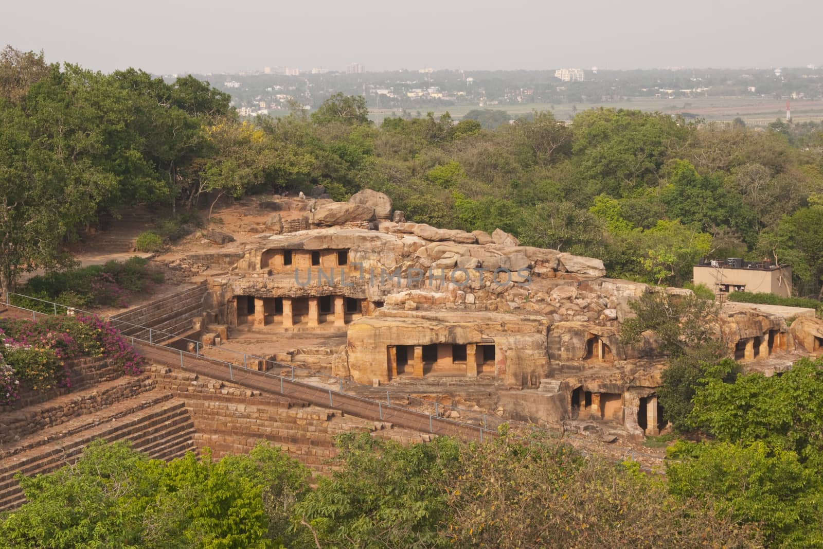 Jain cave temples carved out of the solid rock of the hillside at Bhubaneshwar, Orissa, India. 1st Century BC