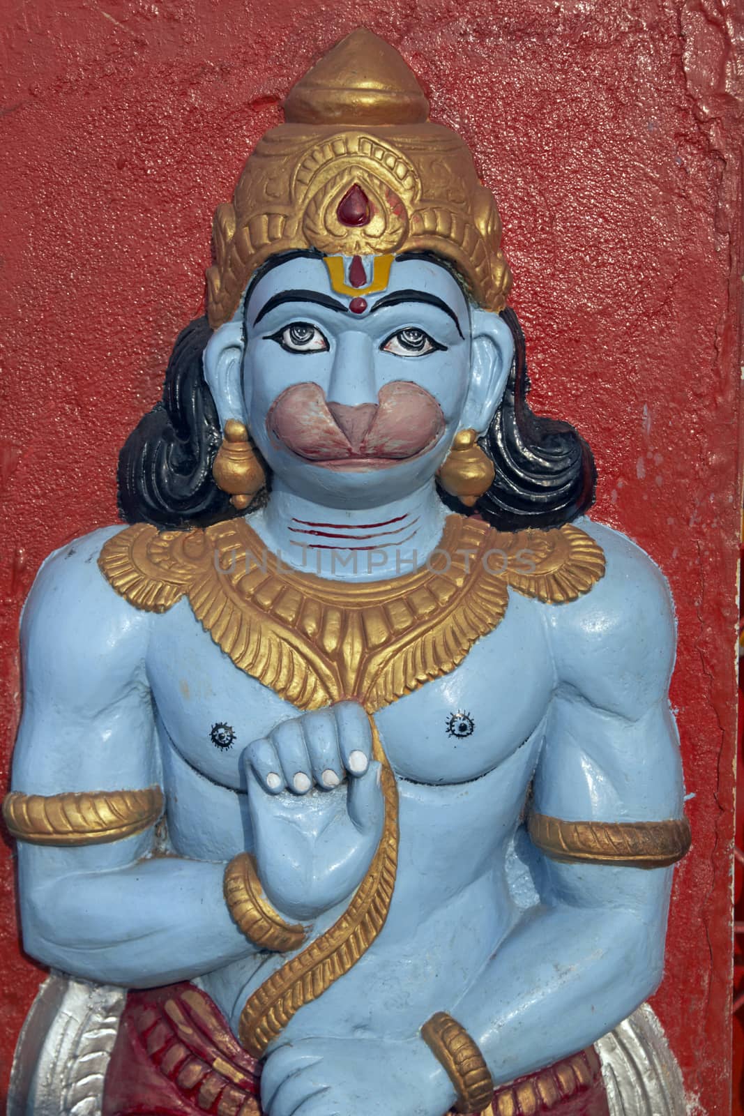 Statue of the Hindu religious figure Hanuman, the monkey god outside a temple in Bhubaneswar, Orissa, India.