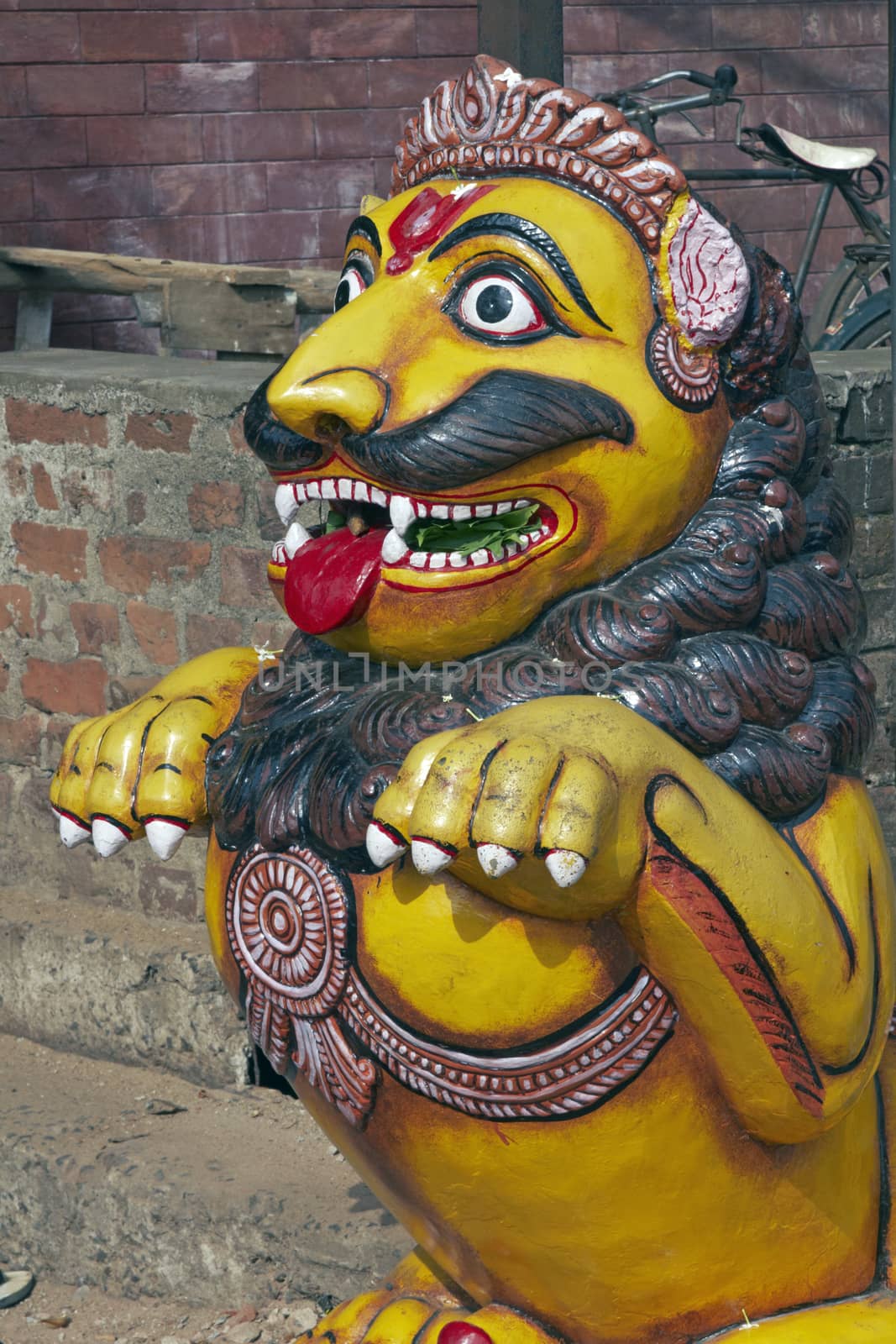 Statue of a lion guarding the entrance to the Lingaraja Hindu Temple in Bhubaneswar, Orissa, India.