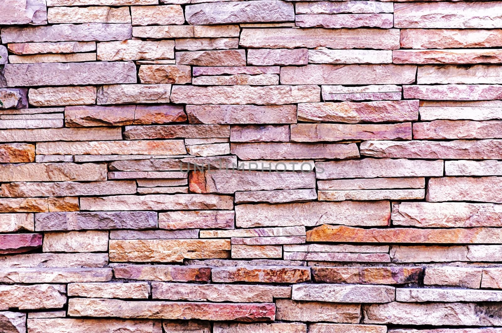 Texture of stone wall  by NuwatPhoto
