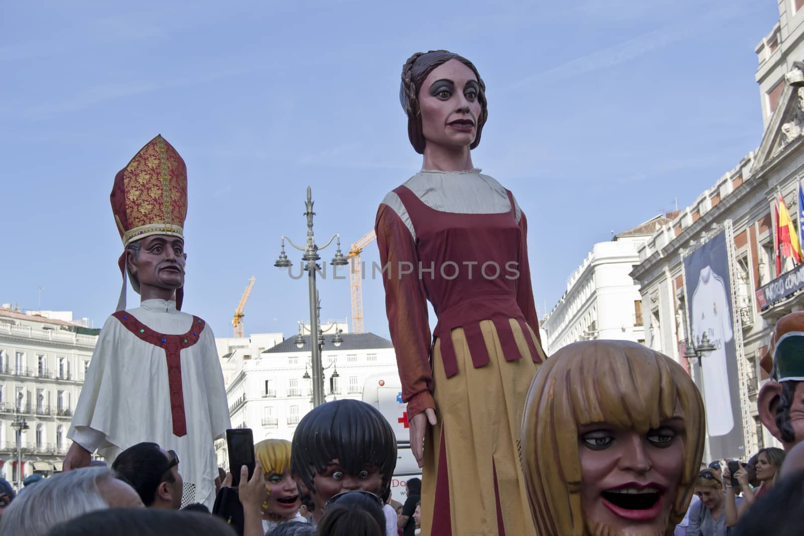 Giants and big heads in Plaza del Sol, Madrid by ncuisinier