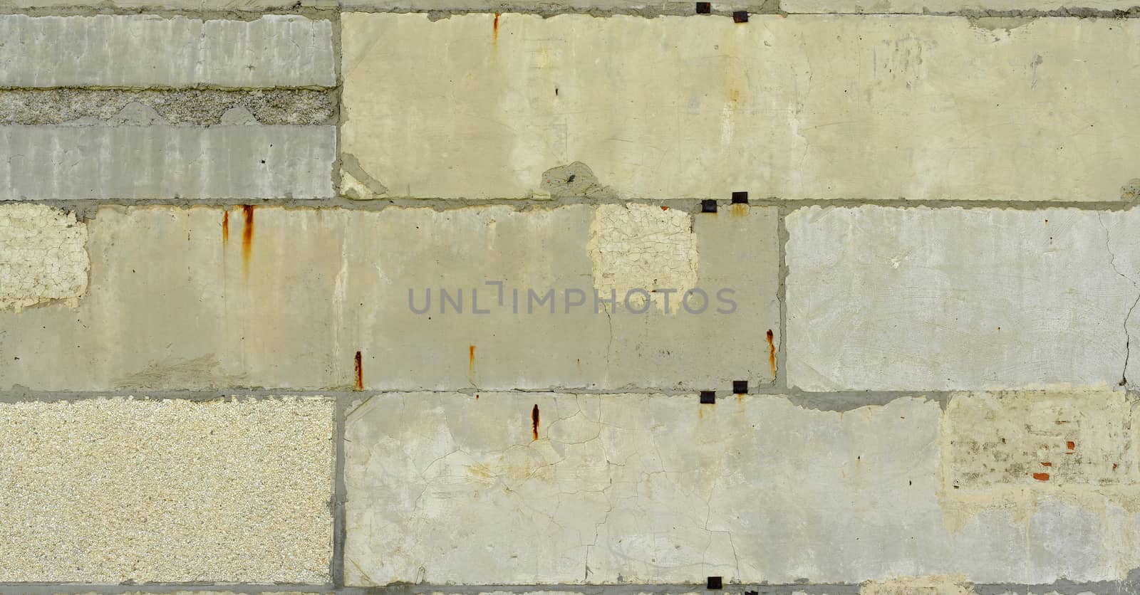 Old, cracked surface of concrete and bricks by cherezoff