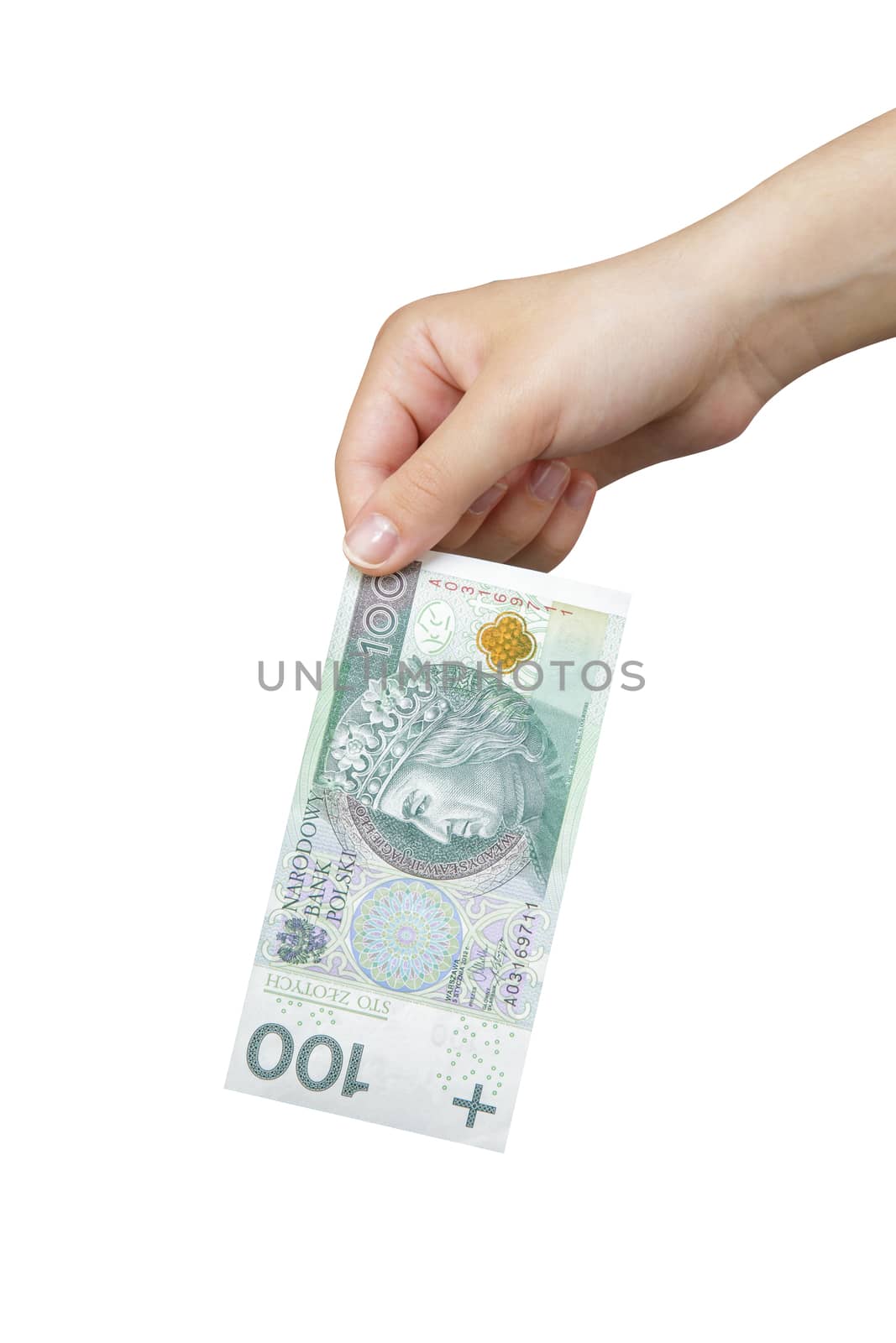 Hand taking a banknote of 100 polish zloty