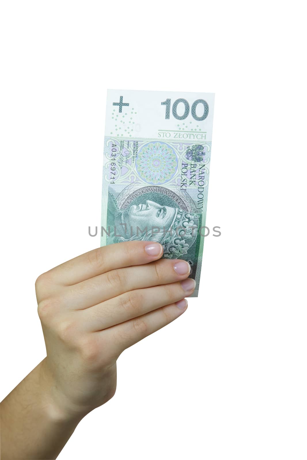 Hand taking a banknote of 100 polish zloty